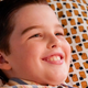 Illustration for article titled Young Sheldon still at large, immune to our nations laws